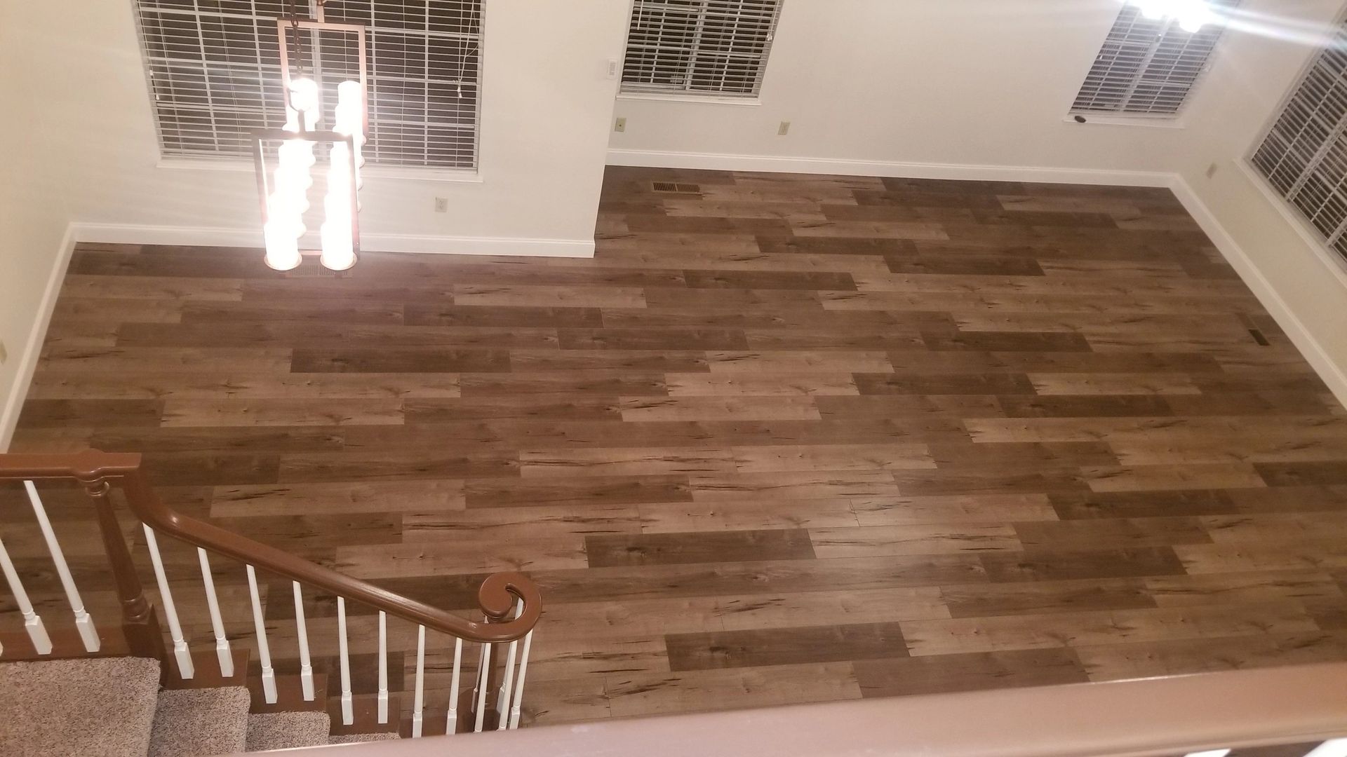 Spacious room with wooden flooring